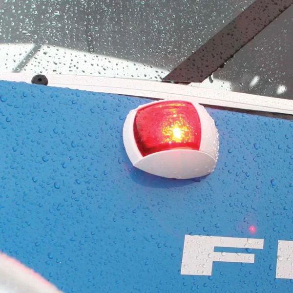 NaviLED Compact IM01 Port Red Lens White Housing Scene Blue Boat Web